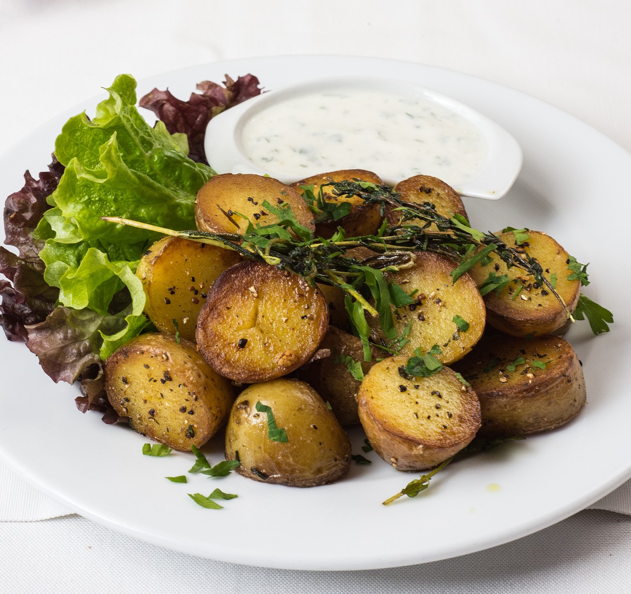 Baked Potatoes With Chive Sauce