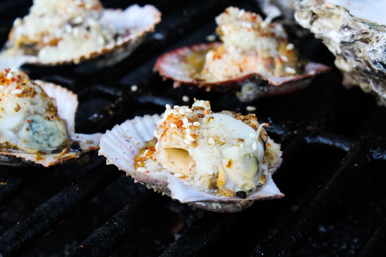 Steamed Oysters in Tomato Vinaigrette Served in Sake Cups