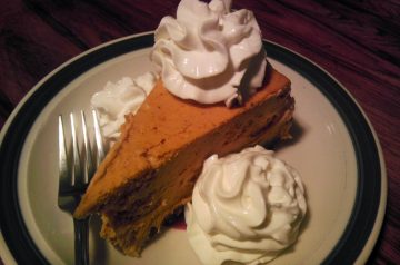 Pumpkin Cheesecake with Bourbon Spiked Cream