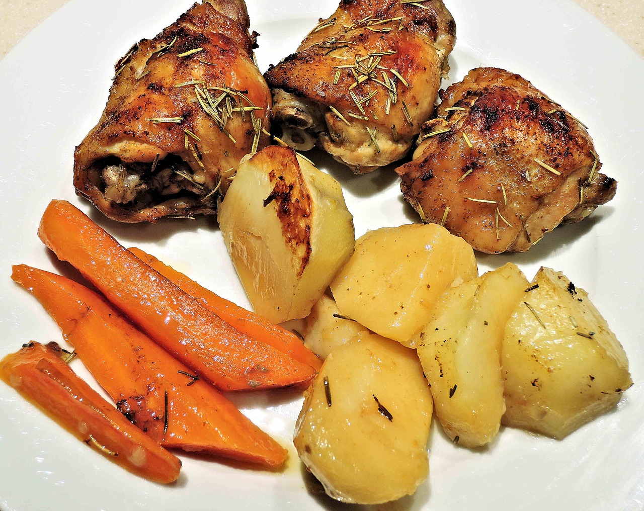 Roasted Garlic Heads and New Potatoes With Rosemary